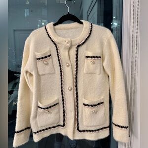 Chic Cream Cardigan with Black Trim